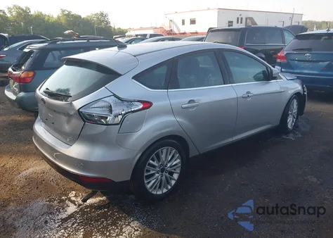 2016 Ford Focus Titanium z USA, uszkodzony, nr VIN 1FADP3N25GL250227